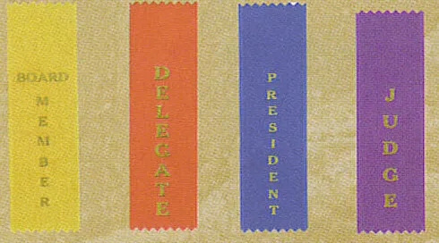 Yellow, orange, blue and purple 2 by 6 inch ribbons printed Board Member, Delegate, President and Judge