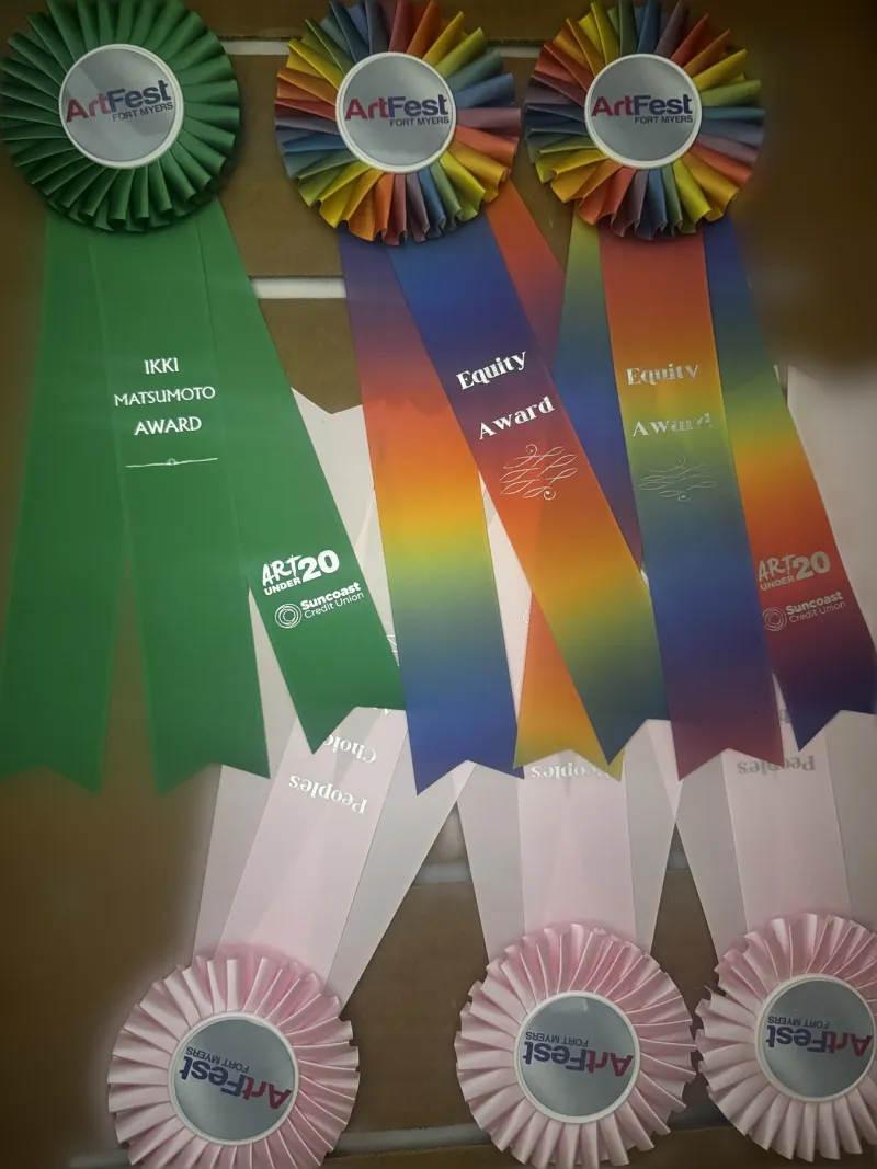 Rainbow streamers and colorful centers.